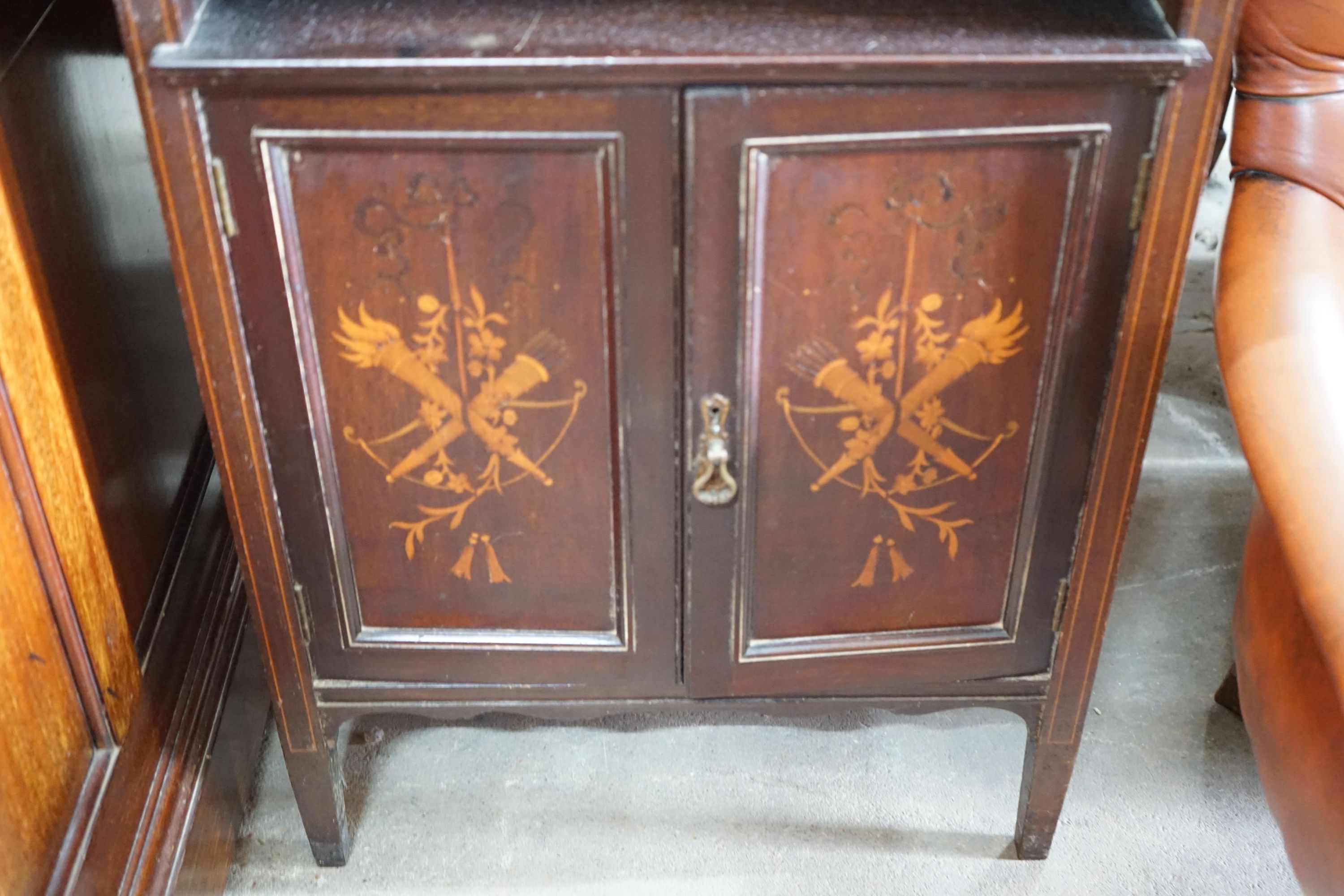 An Edwardian marquetry inlaid mahogany side cabinet, with galleried top, open shelves and a pair of cupboard doors, width 58cm, depth 35cm, height 145cm